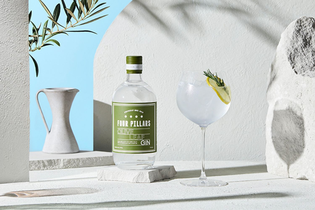 Four Pillars Olive Leaf bottle and a cocktail